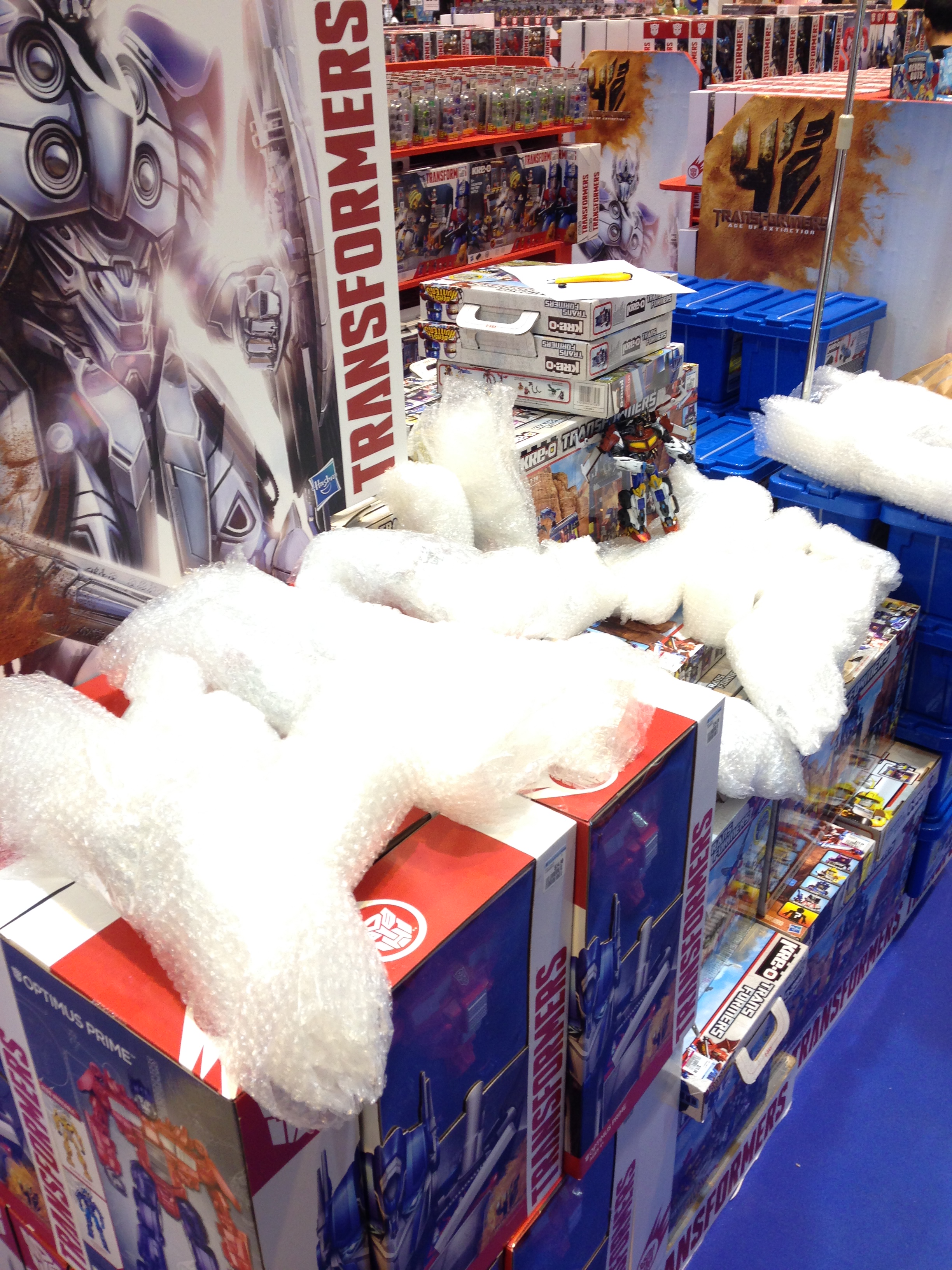 VIctory Saber and the bubble wrapped Transformers.