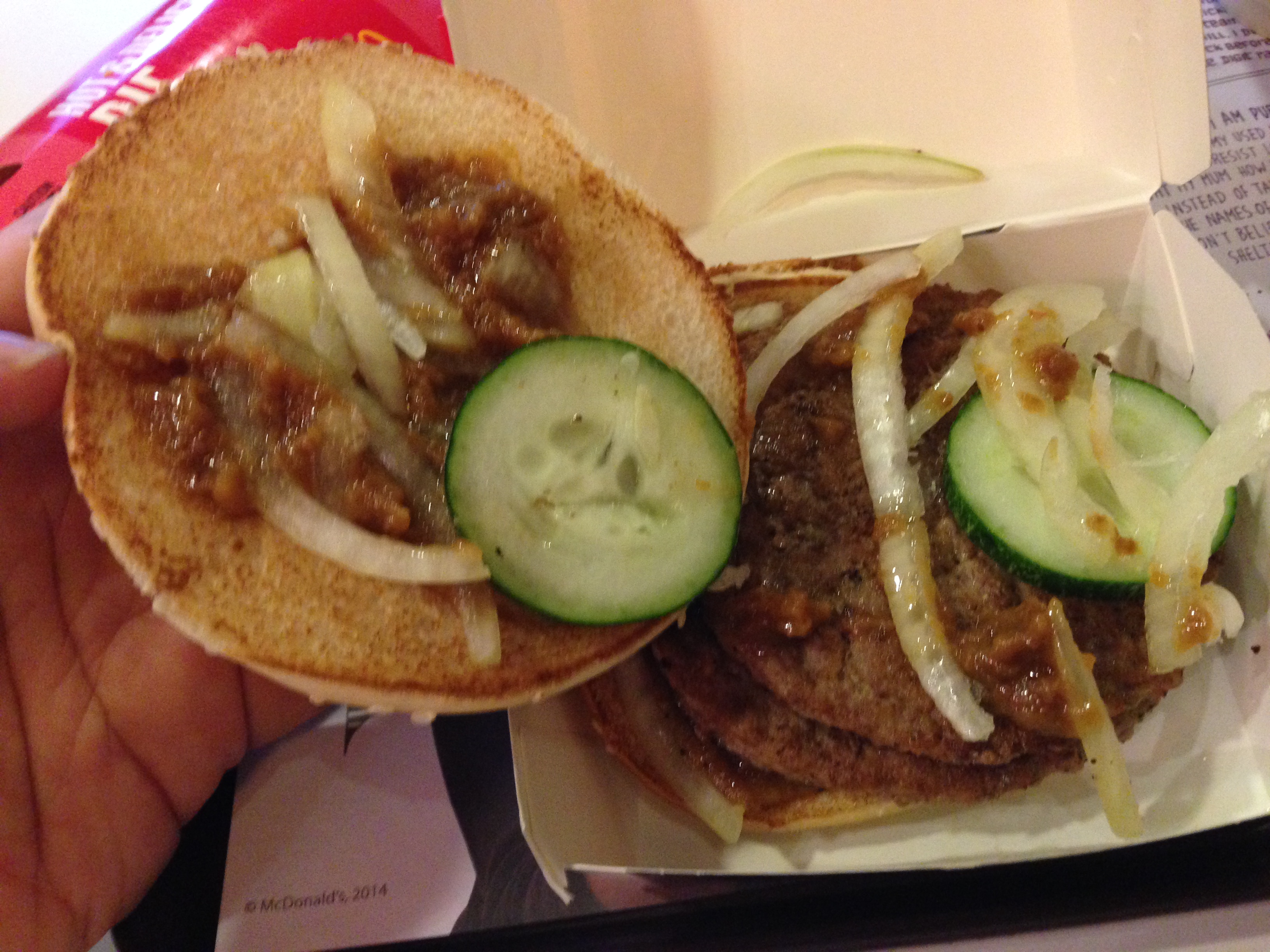 Not enough satay sauce in the burger.