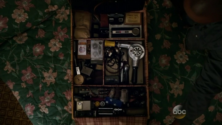 Triplett reveals his stash of 60s weapons. (Agents of SHIELD S01E21)