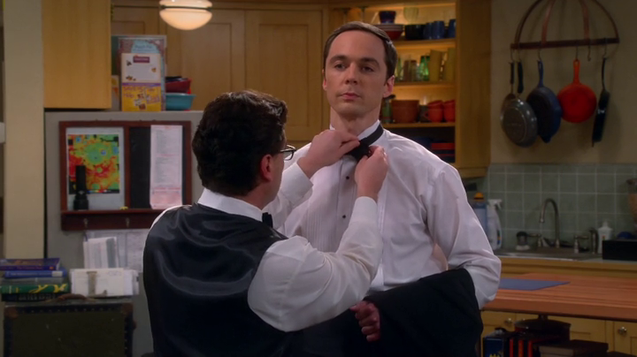 Leonard helps Sheldon with his bow tie. (The Big Bang Theory S08E08)