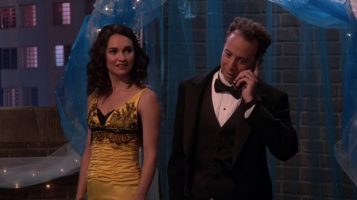 Kara Luiz as Jeanie, with a philandering Stuart on the phone.(The Big Bang Theory S08E08)