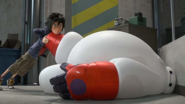 It's tough putting on clothes for Baymax. (Yahoo Movies Singapore)