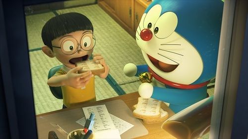 Nobita (Megumi Ohara) learns by eating Memory Bread from Doraemon (Wasabi Mizuta). (Golden Village Pictures)