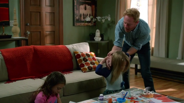 Mitch engages in some hair pulling. ("The Cold" - Modern Family S06E03)