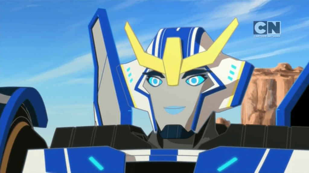 Strongarm looks pleased.  ("Rumble in the Jungle" - Transformers: Robots in Disguise S01E09)