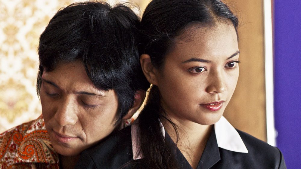 Damien (Ian Tan) and Amrah (Nadia Ar) are star-cross lovers in "In The Room." (Encore Films)