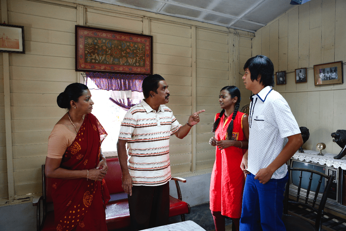 Shamugen (Silvarajoo Prakasam) and his wife confront Rani and Ah Hee in "Long Long Time Ago 2." (Golden Village Pictures)