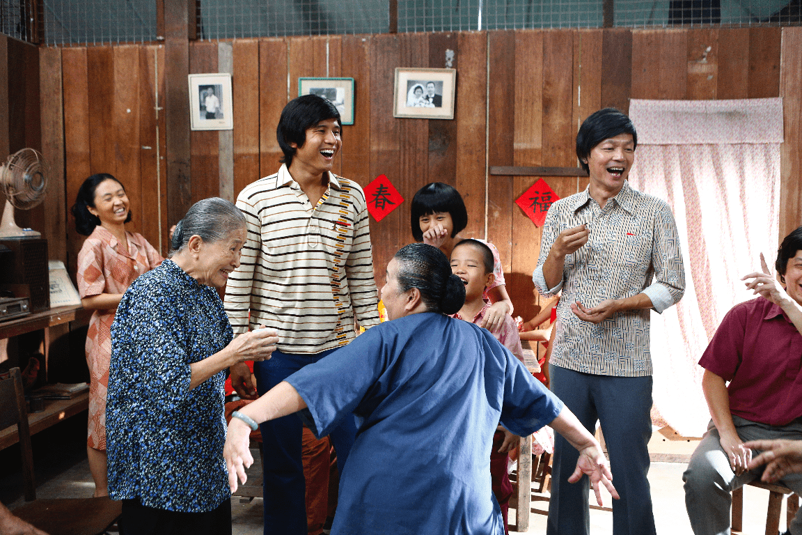 Ah Feng (Charmaine Sei), Ah Ma (Ng Suan Loi), Ah Hee and Ah Kun enjoy the festivities in "Long Long Time Ago 2." (Golden Village Pictures)