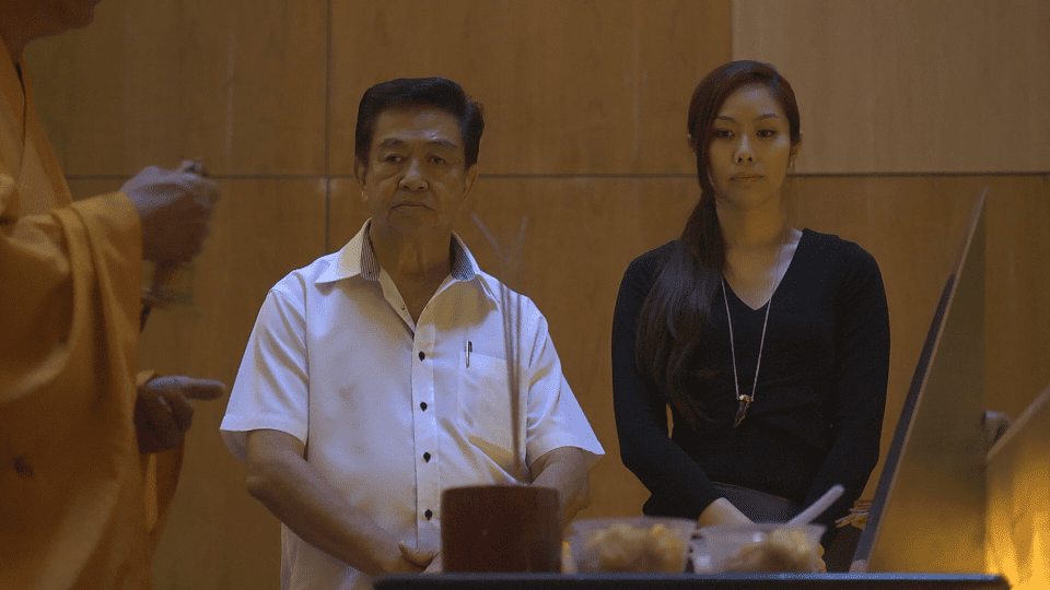 Mr Roland Tay and daughter Ms Jenny Tay on "Death is our Business." (Mediacorp Channel 5)