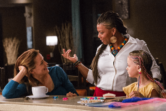 Christy and Anna (Kylie Rogers) are regaled by Angela (Queen Latifah) in "Miracles from Heaven." (Sony Pictures)
