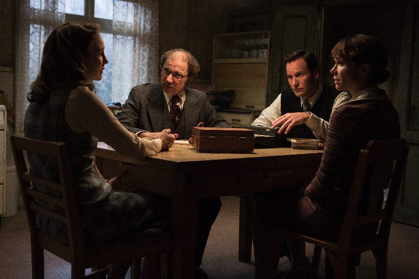 Vera, Maurice (Simon McBurney), Ed (Patrick Wilson), and Peggy (Frances O'Connor) discuss what has happened in "The Conjuring 2." (Warner Bros Pictures)