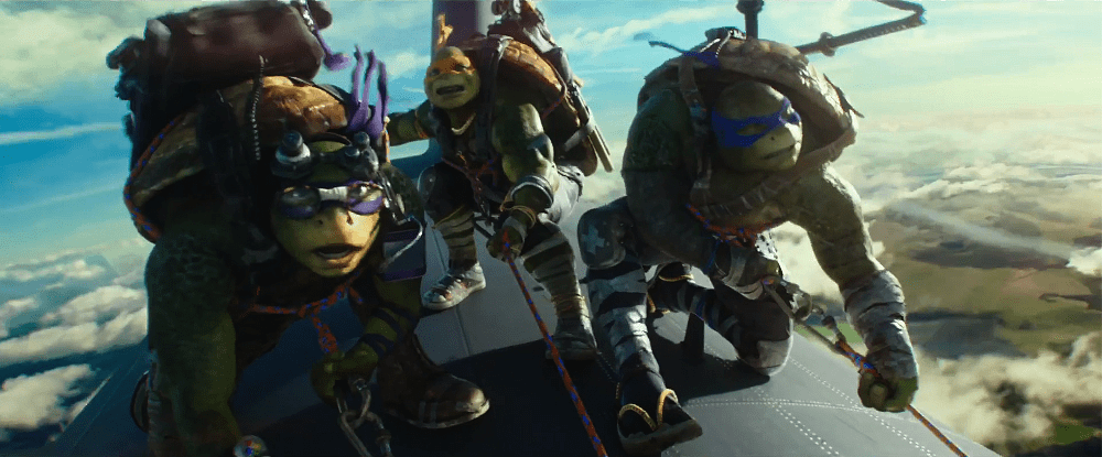 Donatello, Michelangelo, and Leonardo in the air in "Teenage Mutant Ninja Turtles: Out of the Shadows" (United International Pictures)