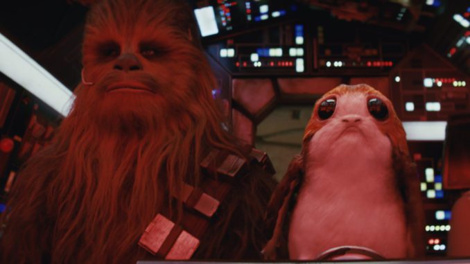 Chewbacca (Joonas Suotamo) and a Porg in "Star Wars: The Last Jedi" (Walt Disney Pictures)