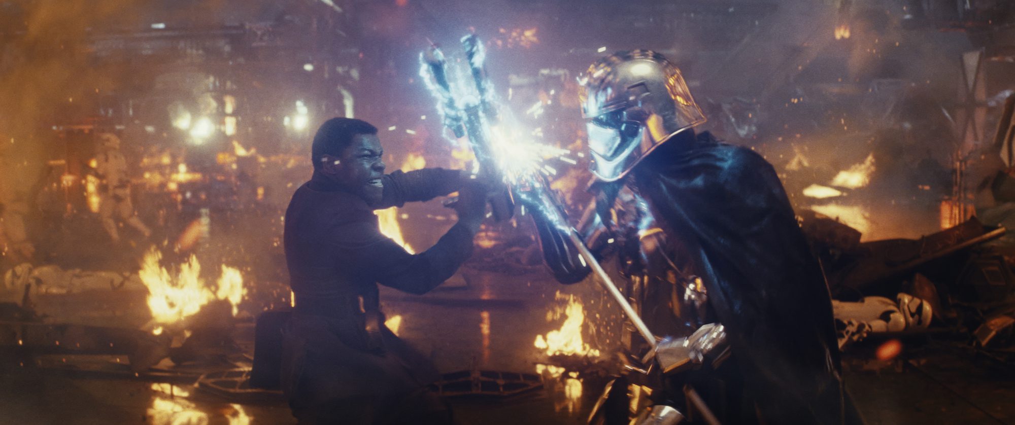 Finn (John Boyega) battling Captain Phasma (Gwendoline Christie) in "Star Wars: The Last Jedi" (Walt Disney Pictures)
