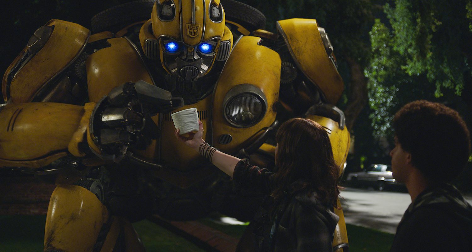 Left to right: Bumblebee, Hailee Steinfeld as Charlie and Jorge Lendeborg Jr. as Memo in BUMBLEBEE, from Paramount Pictures.