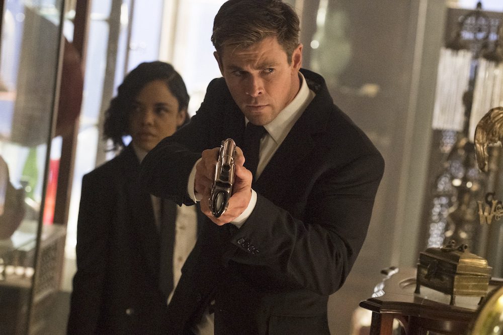 Agent M (Tessa Thompson) and Agent H (Chris Hemsworth) in an Antiques Shop in Columbia Pictures' MEN IN BLACK: INTERNATIONAL.