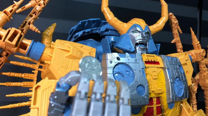 Unicron with a 10-cent coin.