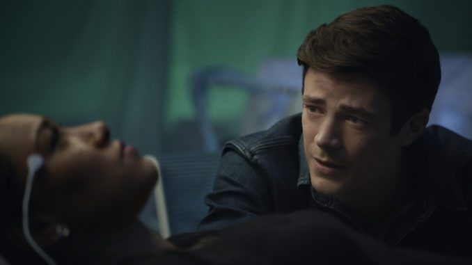 Barry (Grant Gustin) wonders if Iris (Candace Patton) will wake up in The Flash. (PHOTO: Warner TV)