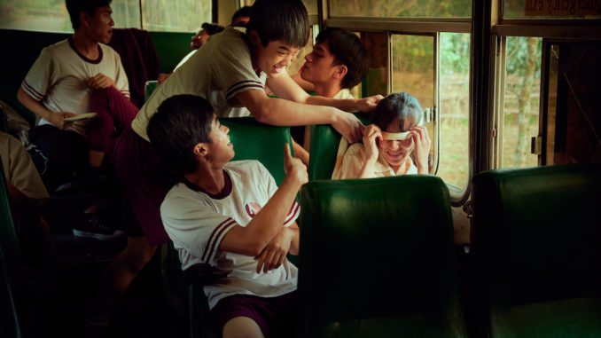 Horseplay in the school bus in The Silent Forest (Image Credit. Disney+)