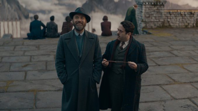Dumbledore (Jude Law) and Jacob (Dan Fogler) in Fantastic Beasts: The Secrets of Dumbledore. (Image credit: Warner Bros Pictures)