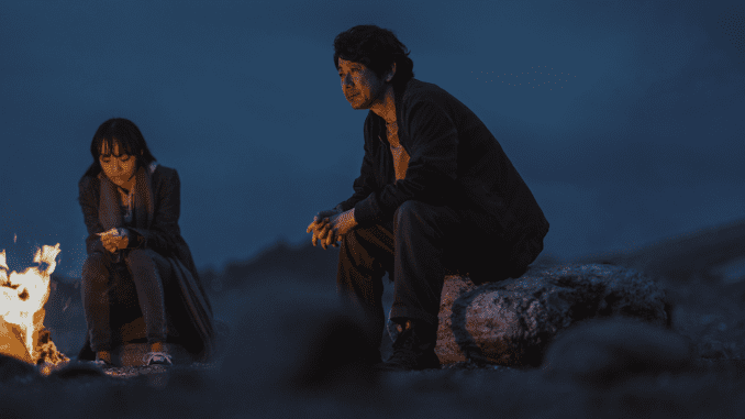 Ami (Mihaya Shirata) talks to Isamu (Masatoshi Nagase) in Last Shadow at First Light. (Credit: Pōtocol, Fourier Films, Studio Virc)