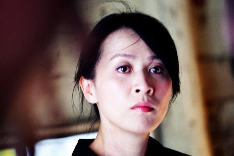Carina Lau as Mary in Infernal Affairs II. (Credit: Netflix and Media Asia Films)