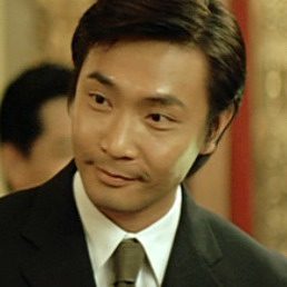 Tay Ping Hui as Hung in Infernal Affairs II. (Credit: Netflix and Media Asia Films)