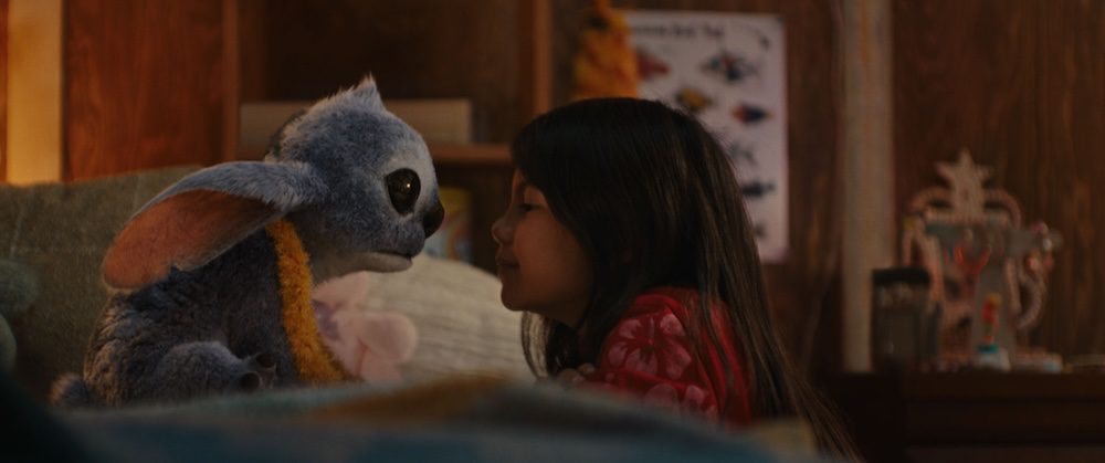 (L-R) Stitch and Maia Kealoha as Lilo in Disney’s live-action LILO & STITCH. Photo courtesy of Disney. © 2025 Disney Enterprises Inc. All Rights Reserved.